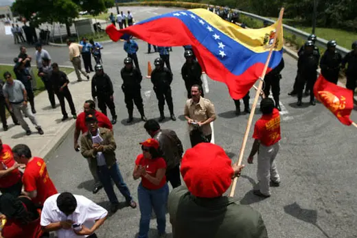Members of the Venezuelan Communist Party and Chavez supporters rally outside the U.S. embassy in Caracas. VENEZUELA