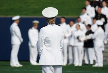 Midshipmen wait to march onto the field during the commissioning and graduation ceremony at the U.S. Naval Academy in Annapolis, Maryland, U.S., May 24, 2024.