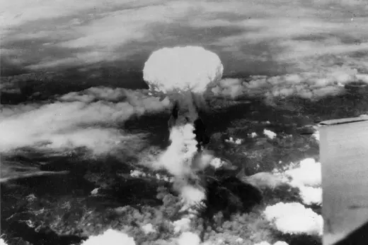 Smoke billows up over Nagasaki, Japan, after the United States drops an atomic bomb on August 9.