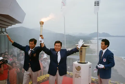 South Korean officials prepare to light the Olympic flame in Seoul.