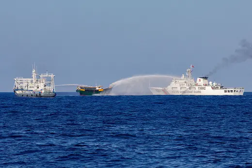Chinese Coast Guard vessels fire water cannons towards a Philippine resupply vessel Unaizah May 4 on its way to a resupply mission at Second Thomas Shoal in the South China Sea.