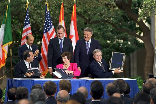 The leaders of the United States, Canada, and Mexico, as well as each country’s chief trade representative, attend the initializing ceremony for the North American Free Trade Agreement in San Antonio, Texas.